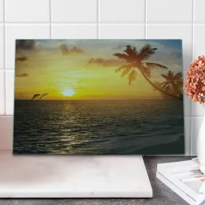 Ambesonne Beach Cutting Board, Palm Trees in Tropical Island Beach Jumping Fishes and Majestic Sunset Image, Decorative Tempered Glass Cutting and Serving Board, Large Size, Yellow Bluegrey
