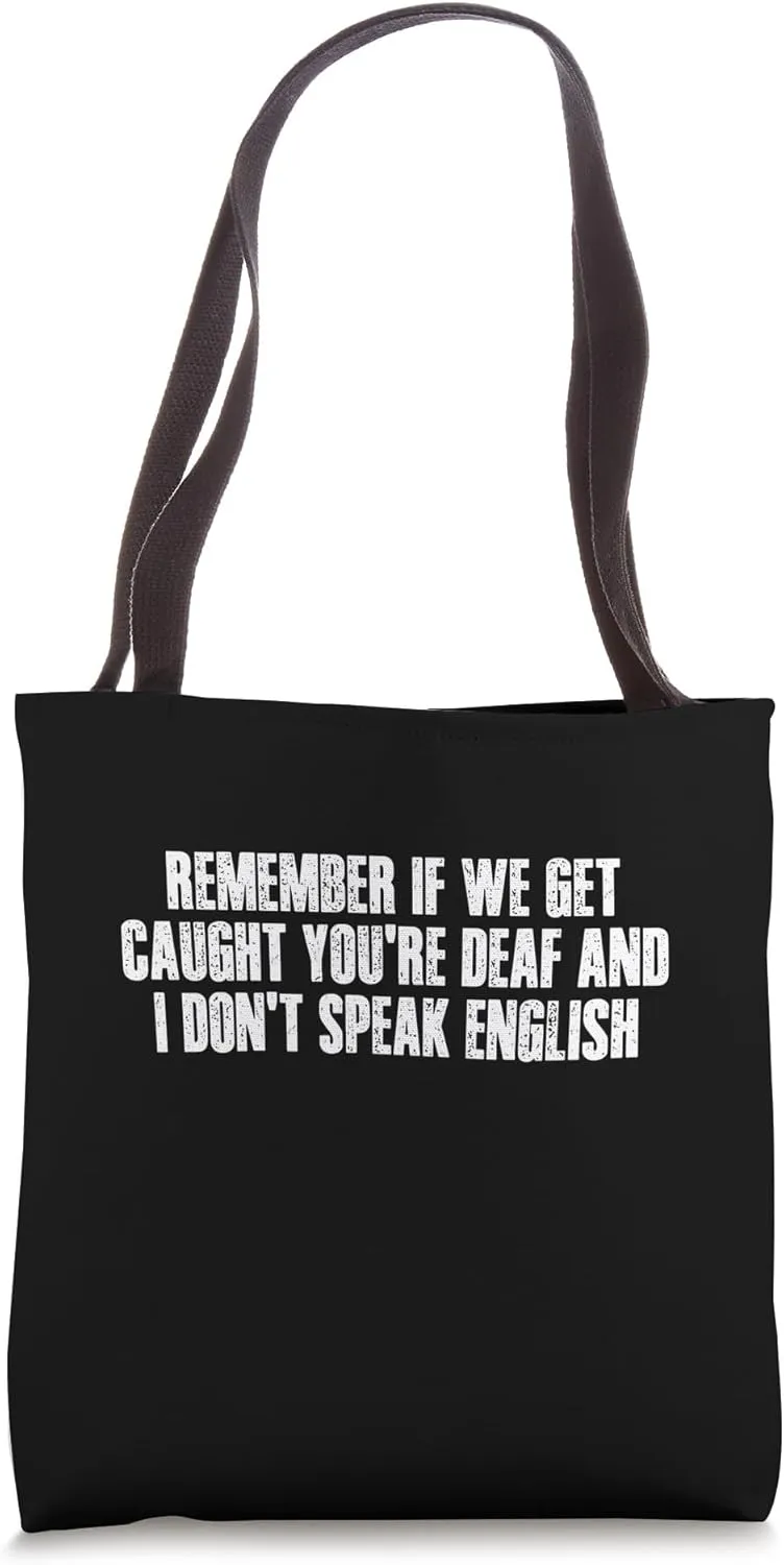 IF WE GET CAUGHT YOU'RE DEAF AND I DON'T SPEAK ENGLISH Tote Bag