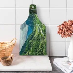Lunarable Landscape Cutting Board, Valley Mountain Tree Mist Waterfall Canyon Alpine Landscape Nature Theme, Decorative Tempered Glass Cutting and Serving Board, Wine Bottle Shape, Green Blue White