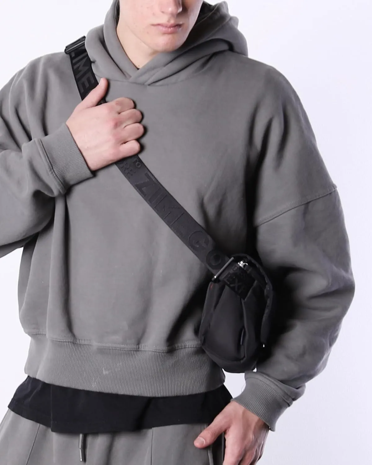 ZIMEGO Tactical Crossbody Sling Bag - Fanny Pack for Travel and Everyday Use, Black